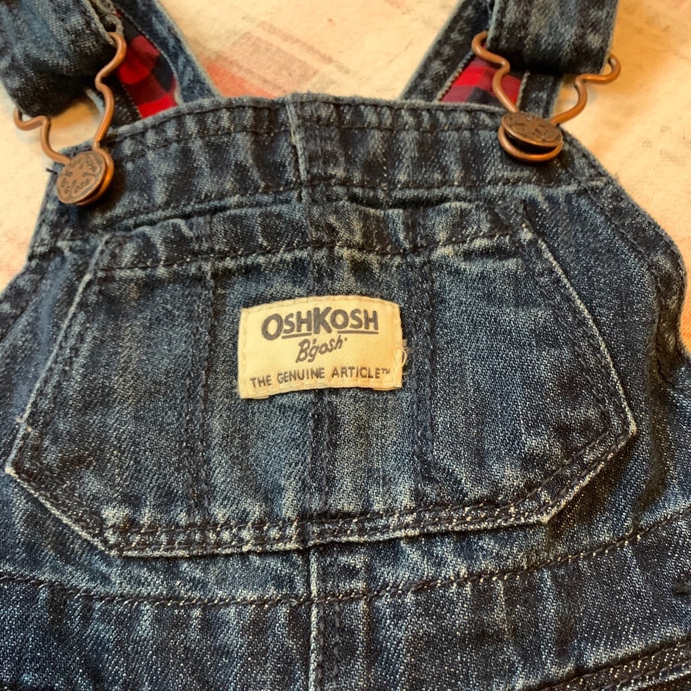 Denim Osh Kosh plaid overalls with silver stars